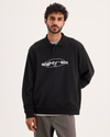 Front view of model wearing Beautiful Black Eighty-Six Collared Sweatshirt, Relaxed Fit.