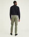 Back view of model wearing Camo Men's Slim Tapered Fit Cargo Pants.