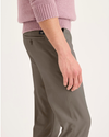 Side view of model wearing Chocolate Chip Essential Chino Pants, Skinny Fit.