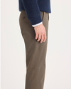 Side view of model wearing Chocolate Chip Ultimate Chinos, Slim Fit.