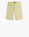 View of model wearing Dusty Yellow Alpha Chino Shorts, Straight Fit.