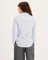 Back view of model wearing Lucent White Signature Shirt with Stain Defender®, Slim Fit.
