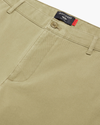 View of model wearing New British Khaki Essential Chino Pants, Slim Fit.