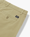 View of model wearing New British Khaki Essential Chino Pants, Slim Fit.