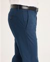 Side view of model wearing Ocean Blue Crafted Khaki Pants, Slim Fit.