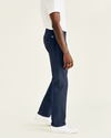 Side view of model wearing Pembroke - Blue Ultimate Chinos, Straight Fit.