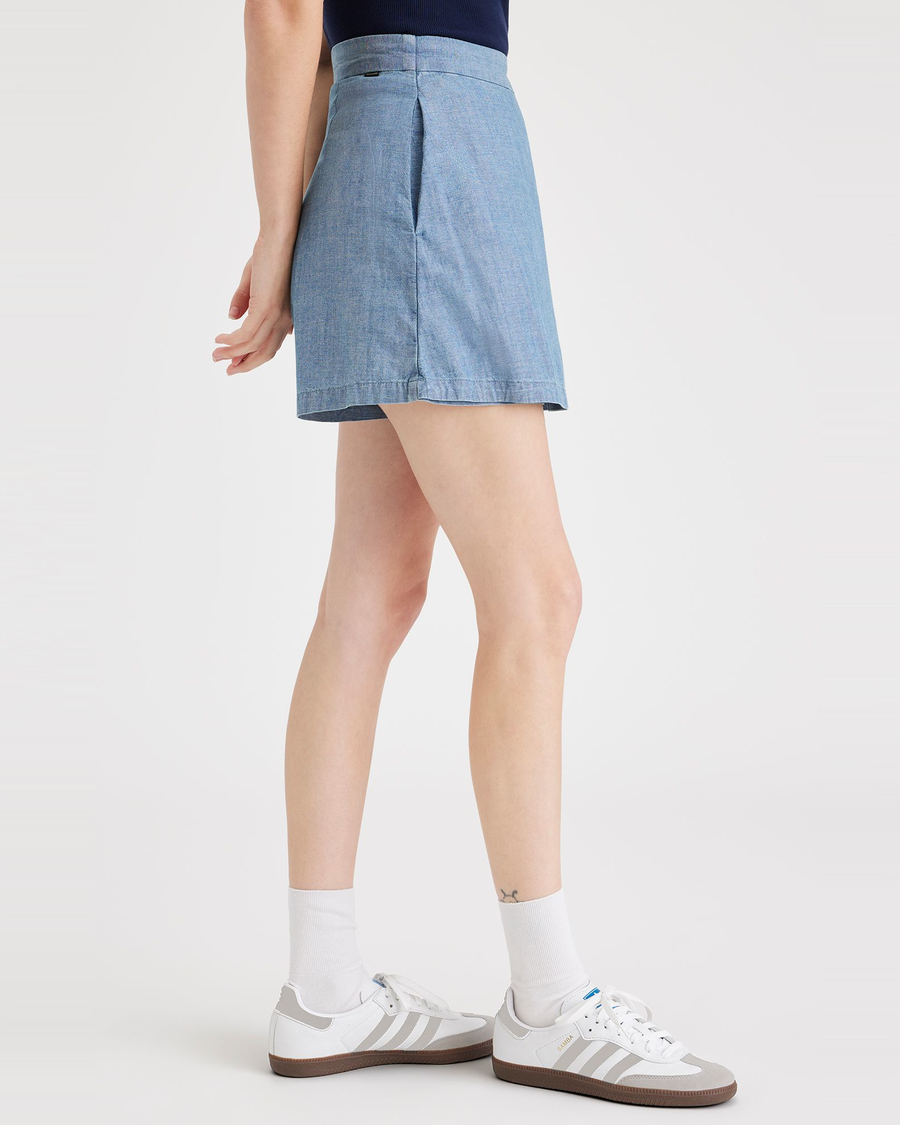 Side view of model wearing Amapola Women's Mini Skirt.