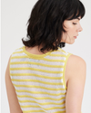 View of model wearing Amar Pineapple Slice Stripe Women's Sweater Tank.