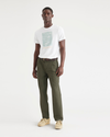 Front view of model wearing Army Green Men's Relaxed Taper Fit Original Pleated Chino Pants.