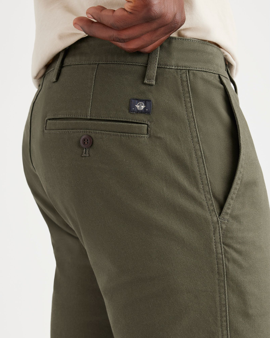 View of model wearing Army Green Men's Skinny Fit Original Chino Pants.