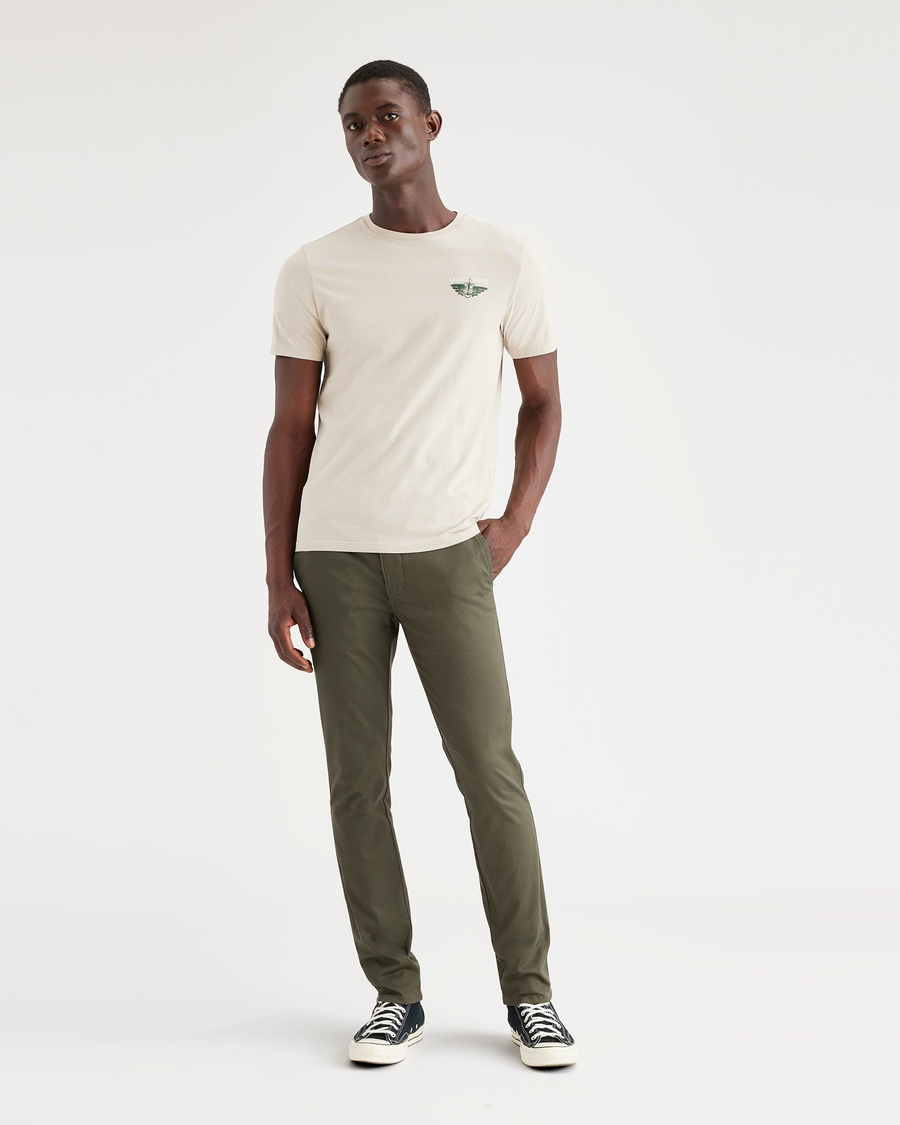 Front view of model wearing Army Green Men's Skinny Fit Original Chino Pants.