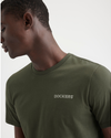 View of model wearing Army Green Men's Slim Fit Logo Tee.