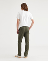 Back view of model wearing Army Green Men's Slim Fit Original Chino Pants.