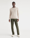 Front view of model wearing Army Green Men's Slim Fit Smart 360 Flex California Chino Pants.