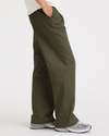 Side view of model wearing Army Green Women's Straight Fit Original Pleated High Wide Khaki Pants.