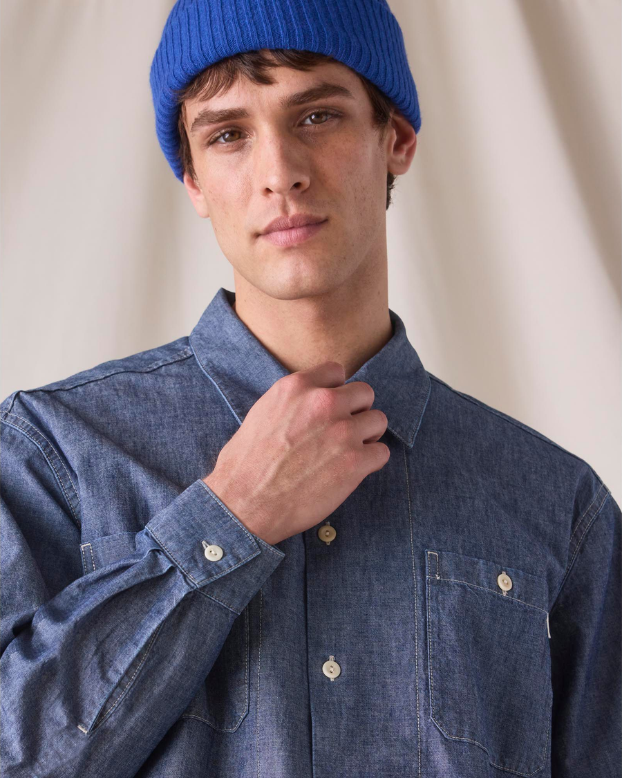 View of model wearing Bay Chambray Dockers® x Transnomadica Dock Shirt.