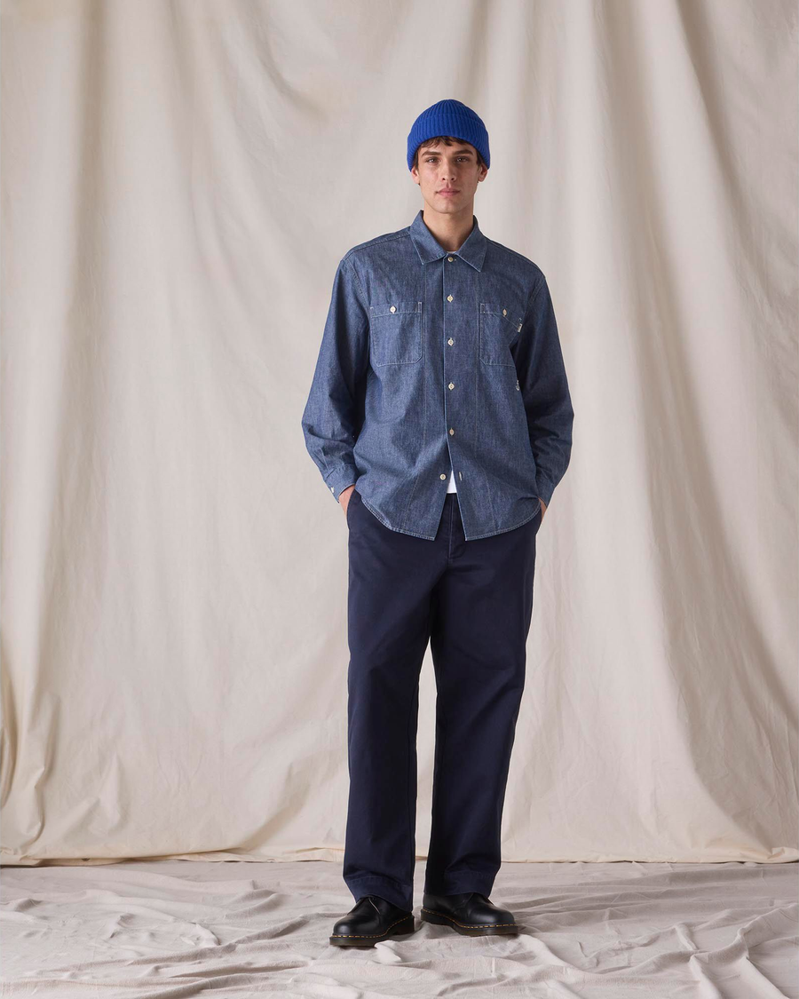View of model wearing Bay Chambray Dockers® x Transnomadica Dock Shirt.