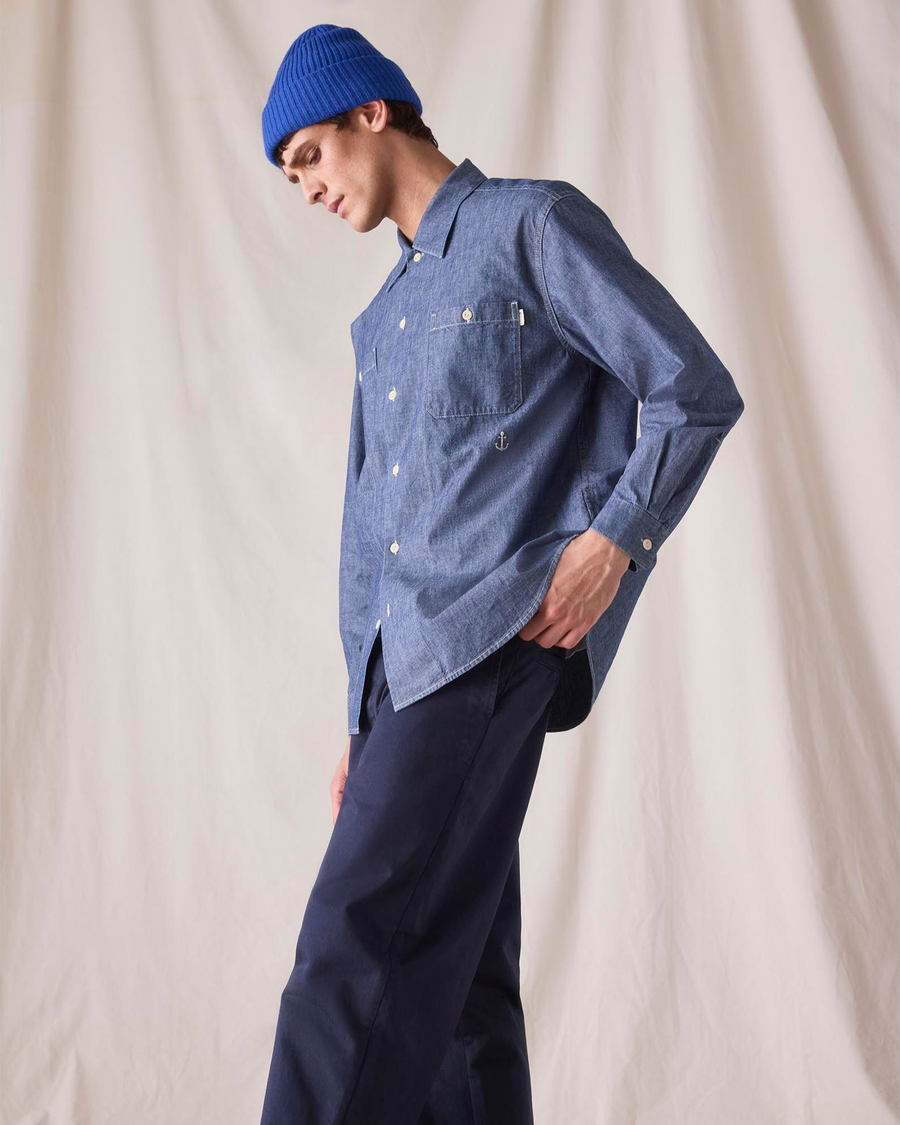 View of model wearing Bay Chambray Dockers® x Transnomadica Dock Shirt.