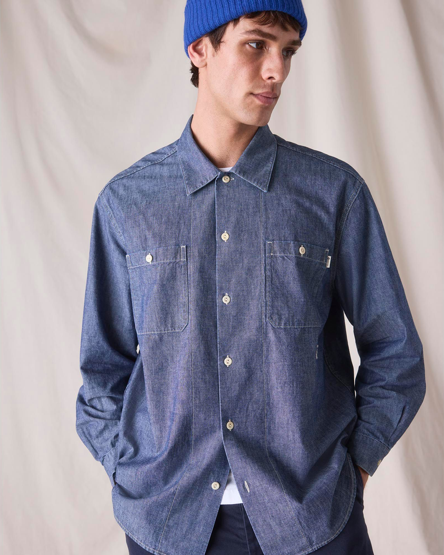 Front view of model wearing Bay Chambray Dockers® x Transnomadica Dock Shirt.