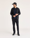 View of model wearing Beautiful Black Go Activeflex Chino, Skinny Fit.