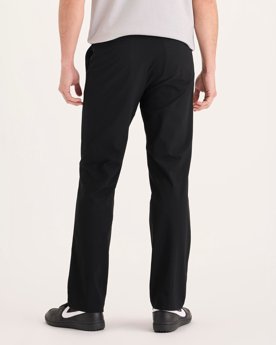 Back view of model wearing Beautiful Black Go Airweave Chino, Straight Fit.