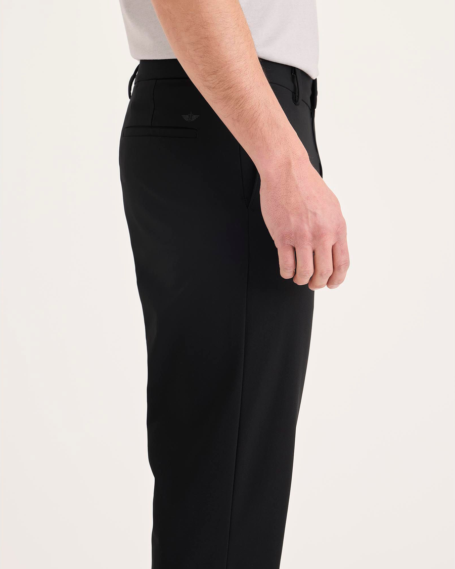 Side view of model wearing Beautiful Black Go Airweave Chino, Straight Fit.