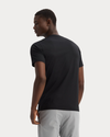 Back view of model wearing Beautiful Black Go Tee, Slim Fit.