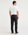 Back view of model wearing Beautiful Black Original Chino, Slim Fit.