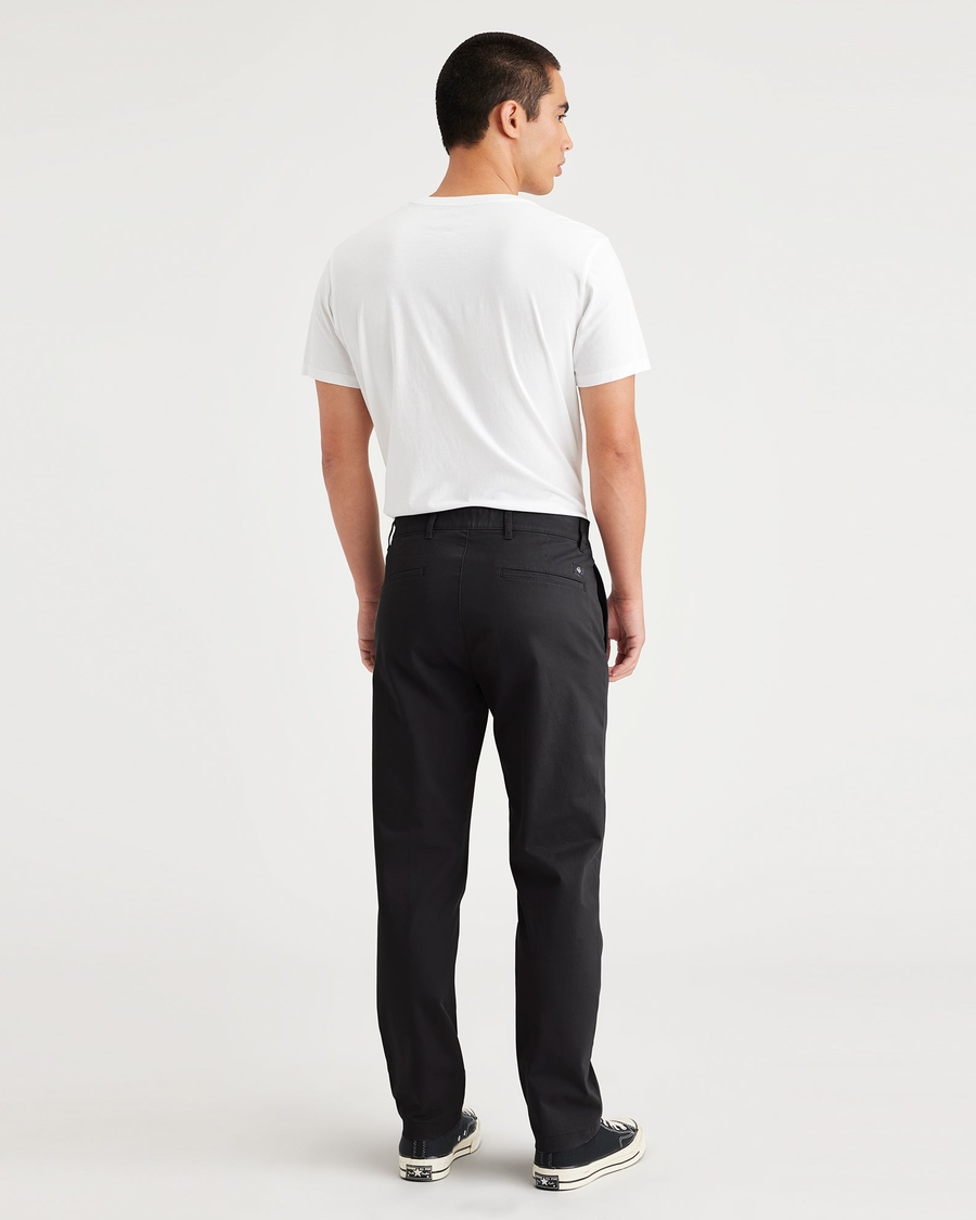 Back view of model wearing Beautiful Black Original Chino, Slim Fit.