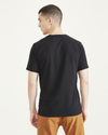 Back view of model wearing Beautiful Black Original Tee.