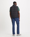 Back view of model wearing Beautiful Black Quilted Vest, Regular Fit.