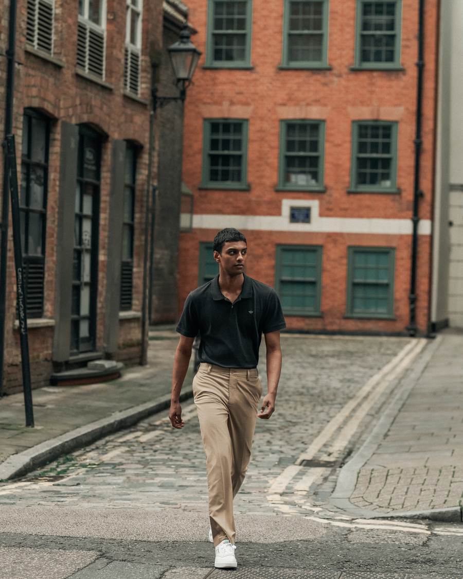 View of model wearing Beautiful Black Signature Go Khaki Pants, Slim Fit.