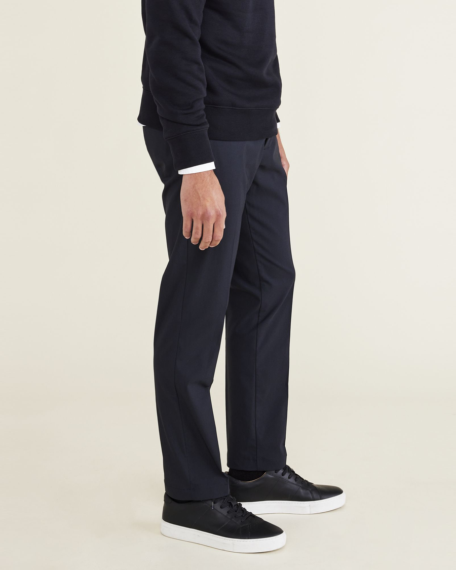 Side view of model wearing Beautiful Black Signature Go Khaki Pants, Slim Fit.