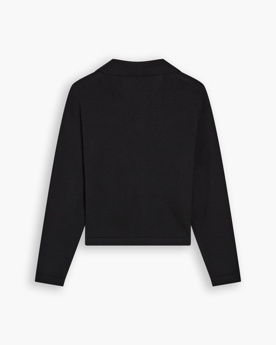 View of model wearing Beautiful Black Sweater Polo, Relaxed Fit.