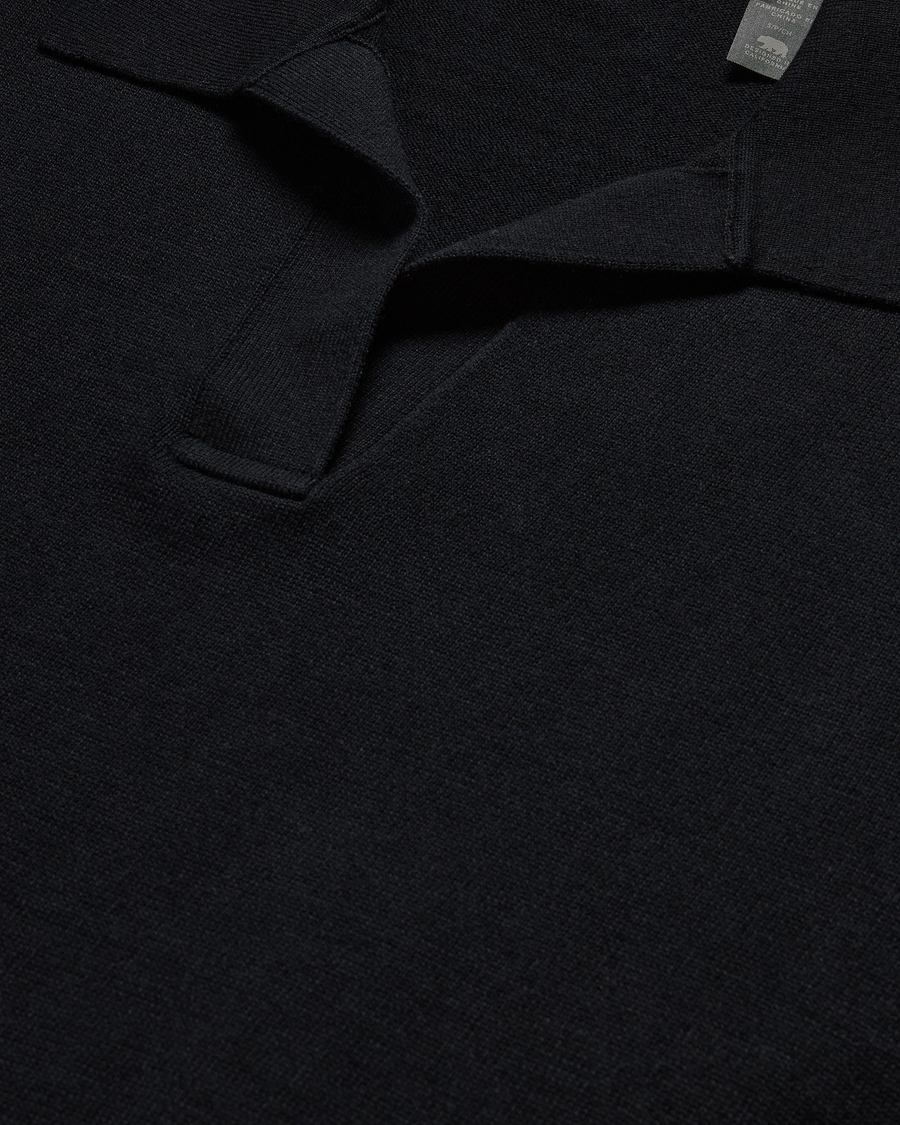 View of model wearing Beautiful Black Sweater Polo, Relaxed Fit.