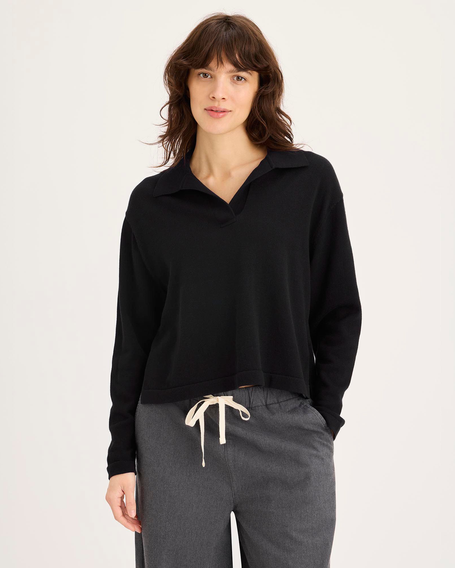 Front view of model wearing Beautiful Black Sweater Polo, Relaxed Fit.