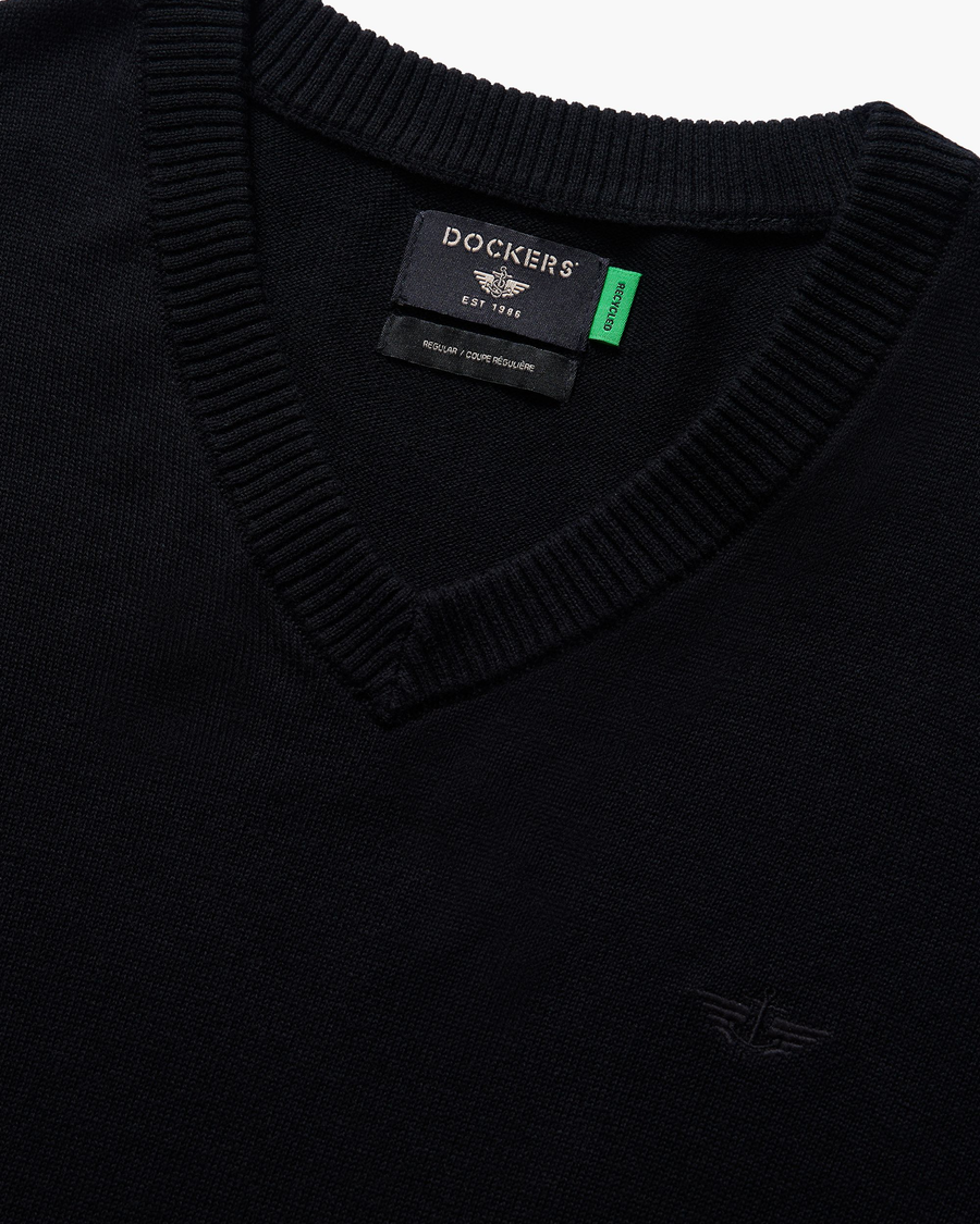 View of model wearing Beautiful Black V Neck Sweater.