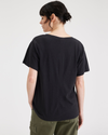 Back view of model wearing Beautiful Black Women's Deep V-Neck Tee Shirt.