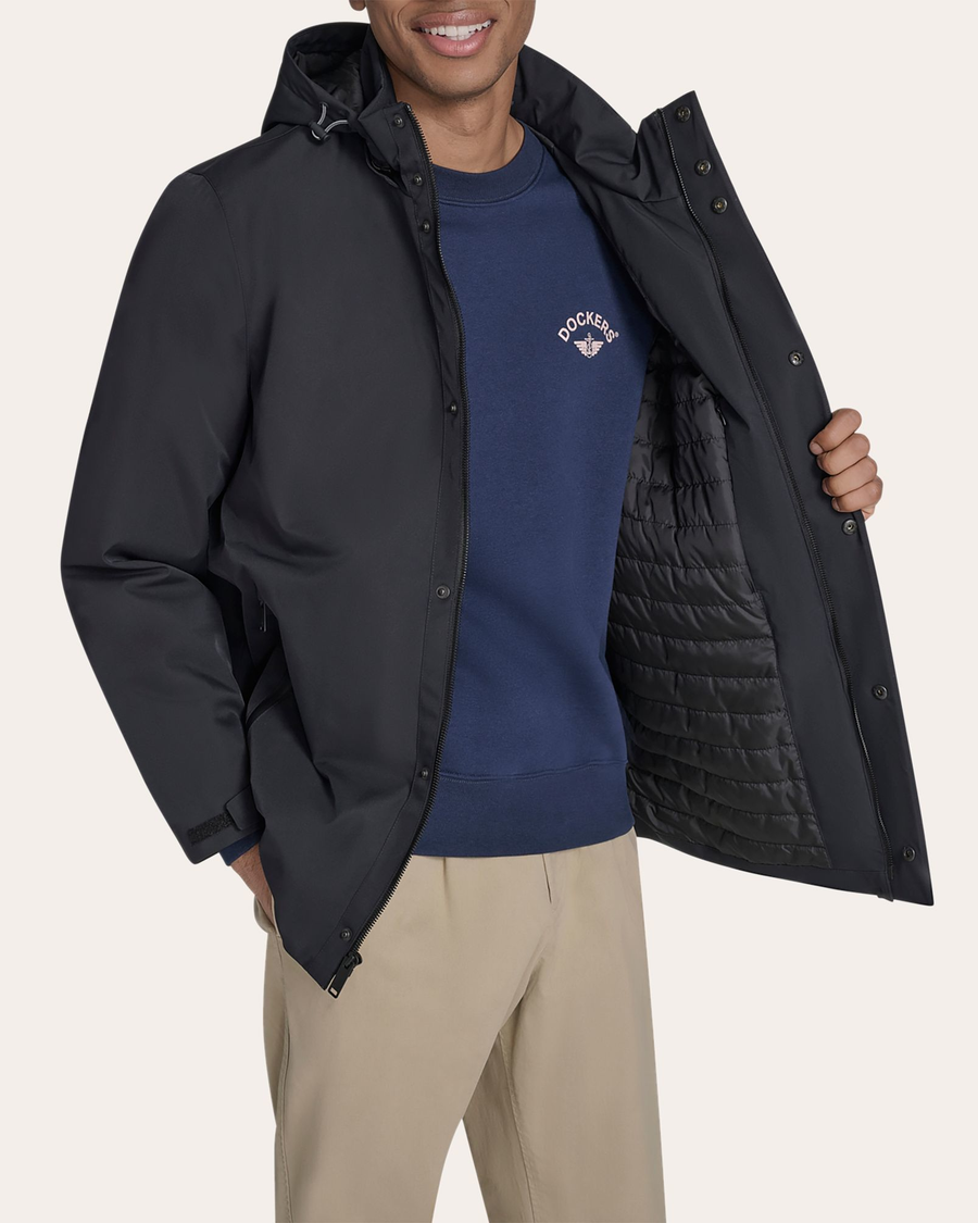 View of model wearing Black Go Rain Commuter Jacket.