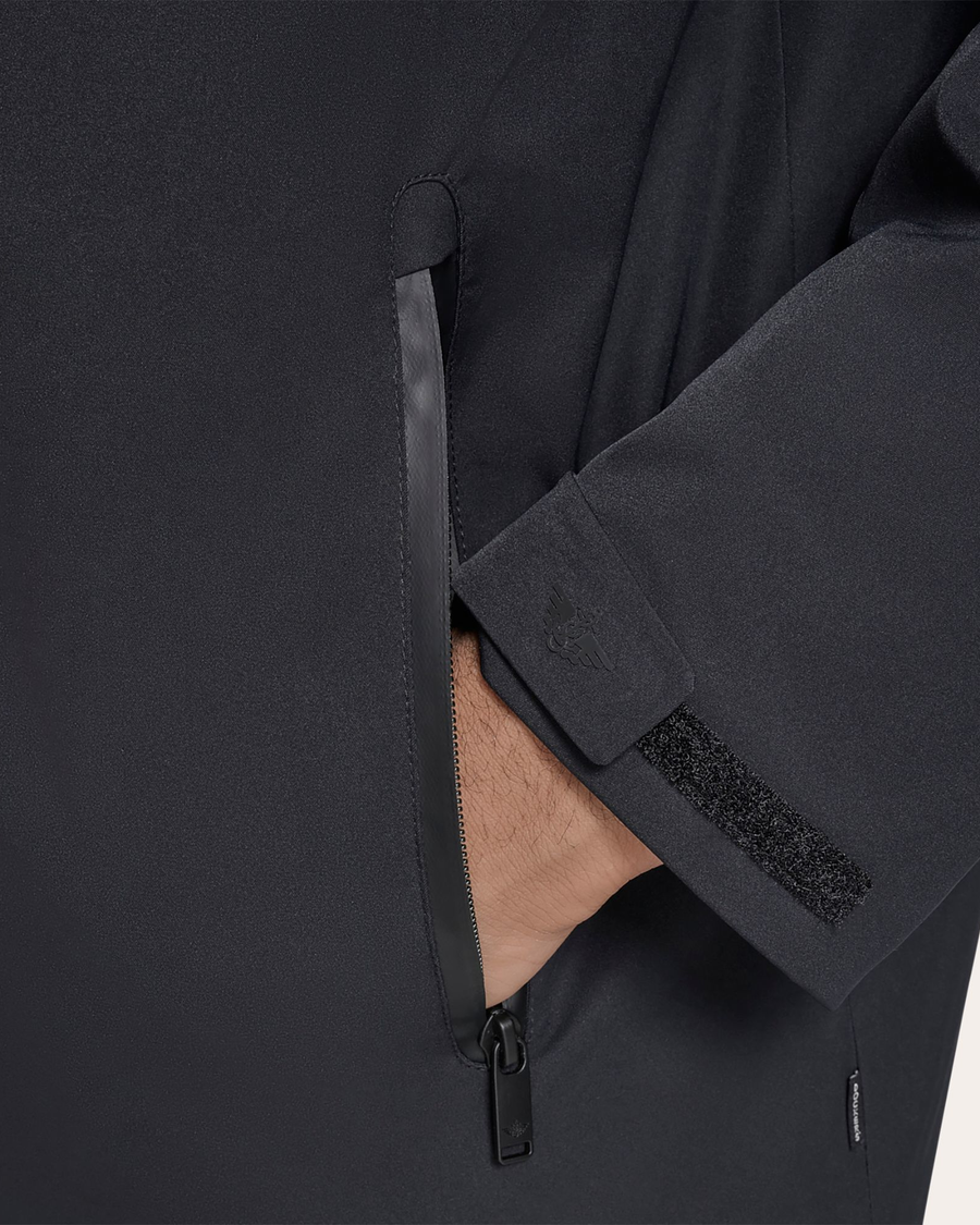 View of model wearing Black Go Rain Commuter Jacket.