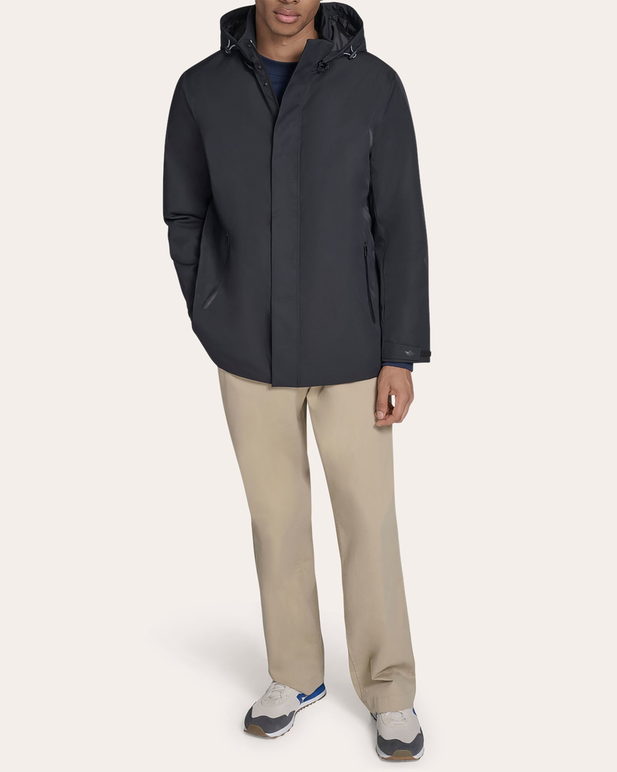 View of model wearing Black Go Rain Commuter Jacket.