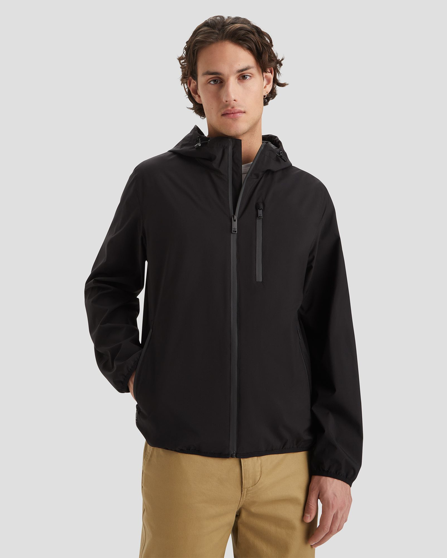 Front view of model wearing Black Men's Lightweight Windbreaker Jacket.