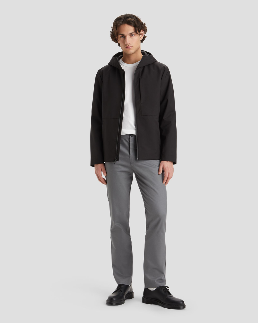 View of model wearing Black Men's Softshell Modern Jacket.