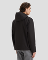 Back view of model wearing Black Men's Softshell Modern Jacket.