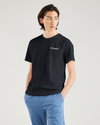 Front view of model wearing Black Stencil Graphic Tee, Slim Fit.