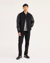 View of model wearing Black Workday Khaki Pants, Slim Fit.