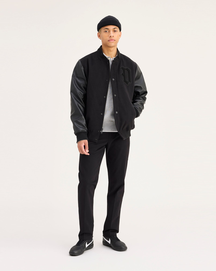 View of model wearing Black Workday Khaki Pants, Slim Fit.