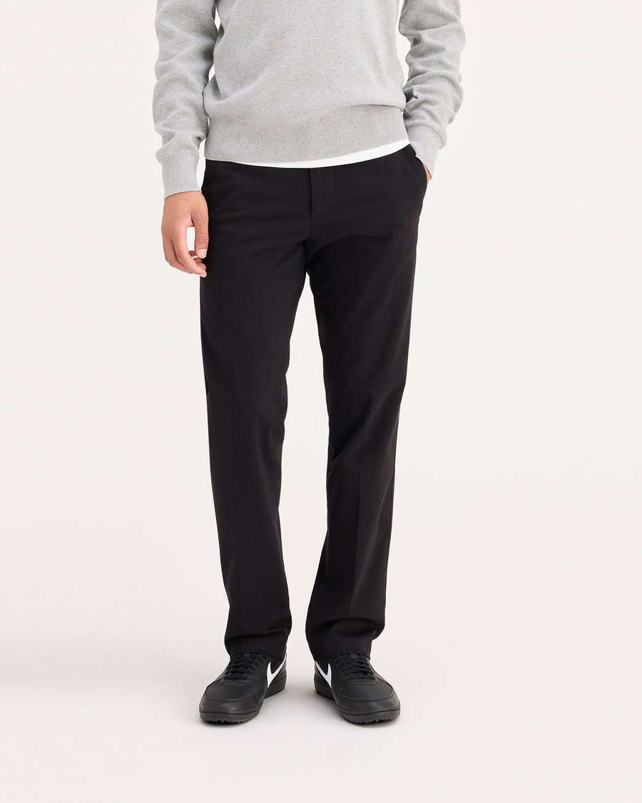 Front view of model wearing Black Workday Khaki Pants, Slim Fit.