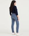 Back view of model wearing Blue Fusion Women's Skinny Fit Chino Pants.