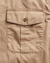 View of model wearing Broad Khaki Dockers® x Transnomadica Officer Shirt.